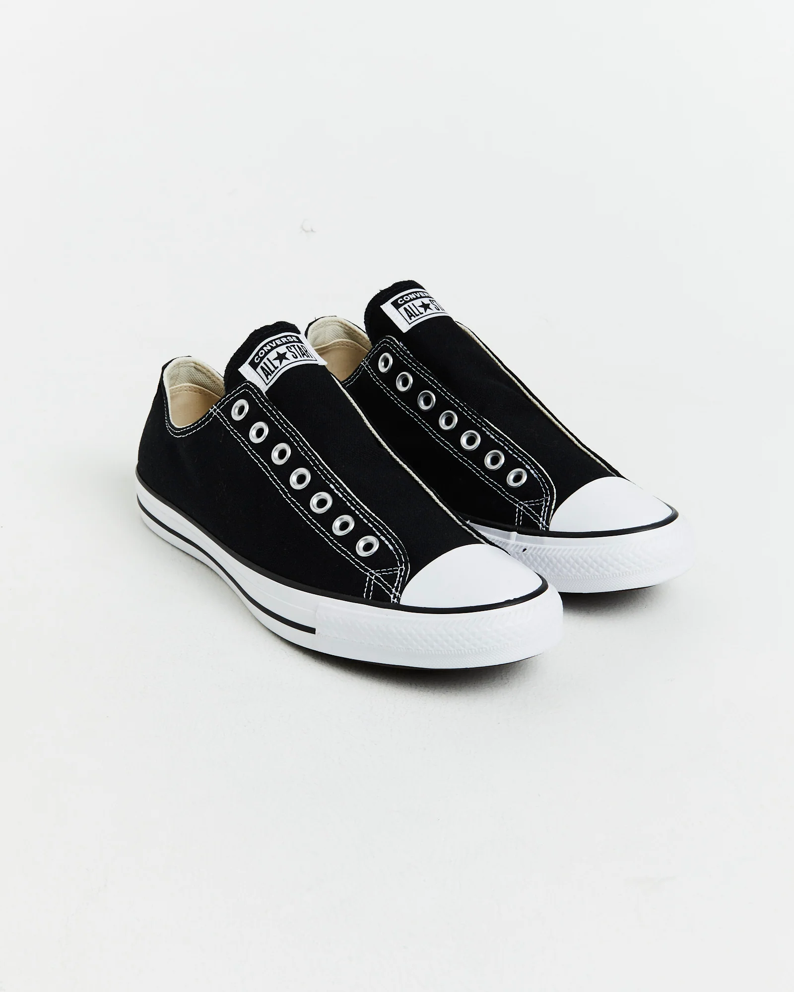 Chuck Taylor All Star Slip On Sneakers In Black/White - Image 2