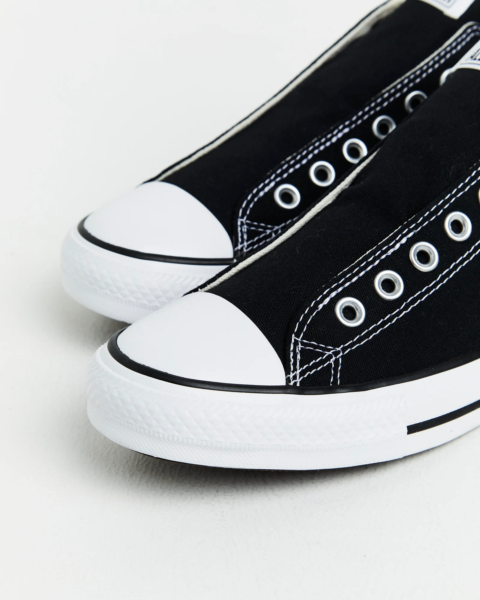 Chuck Taylor All Star Slip On Sneakers In Black/White - Image 5